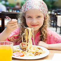 A spaghetti dinner is a school fundraiser that makes for a memorable evening for families.