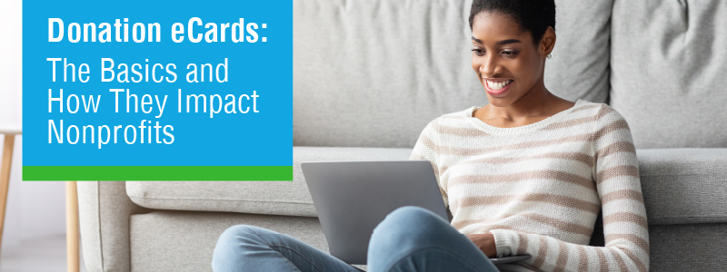The article’s title, “Donation eCards: The Basics and How They Impact Nonprofits,” alongside a woman sitting with her laptop.